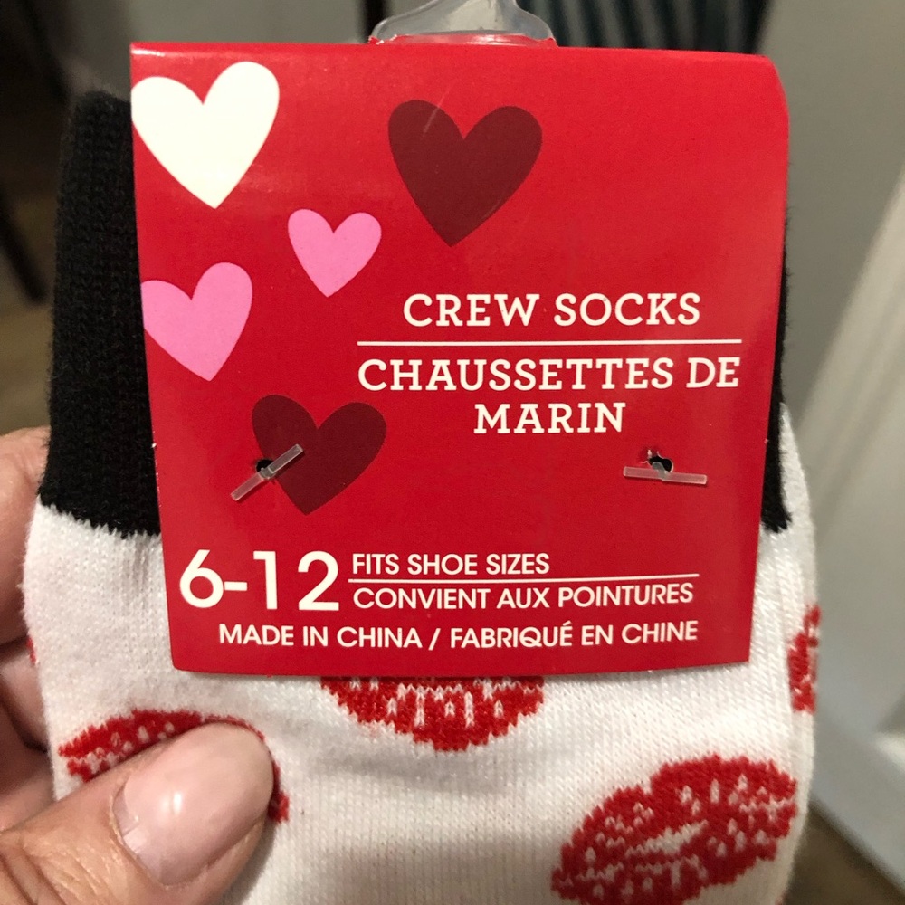 Crew socks. Fits size 6-12. New with tags